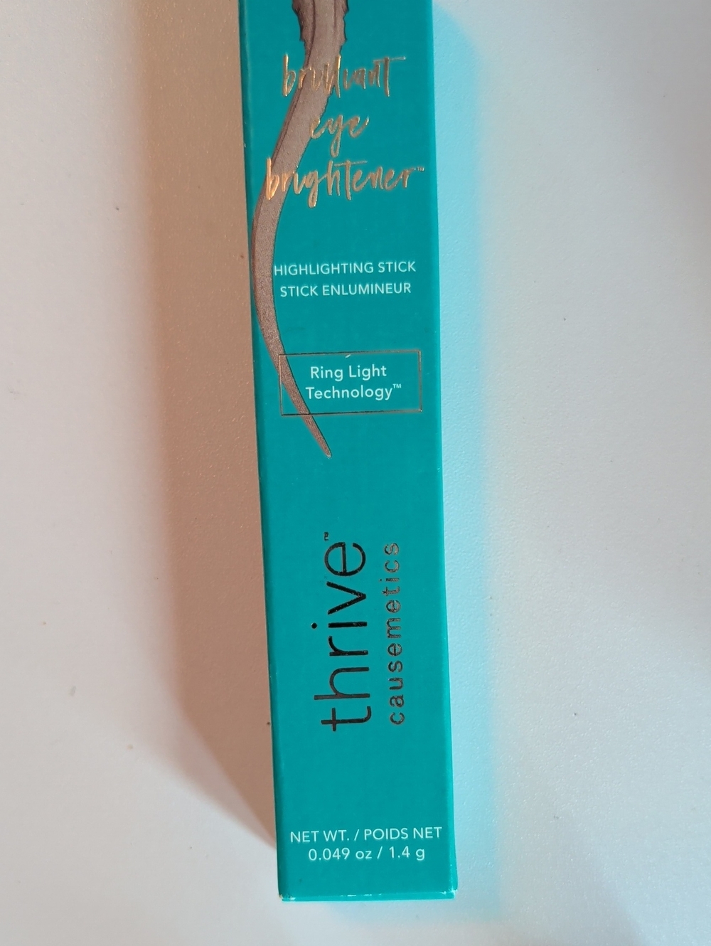 thrive causemetics Callie Greige Taupe Shimmer Highlighter Stick